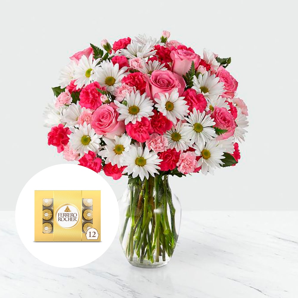 Amor en primavera Sorprendente + Ferrero Rocher x12 Unid, Fresh Flowers Orlando, Florist Regalo De Flores Para Toda Ocasión, Arreglo Flores Amor Primaveral, Claveles, Margaritas, es un hermoso regalo de aniversario, regalo de flores de cumpleaños.Floristería En Orlando, FL. Delivery