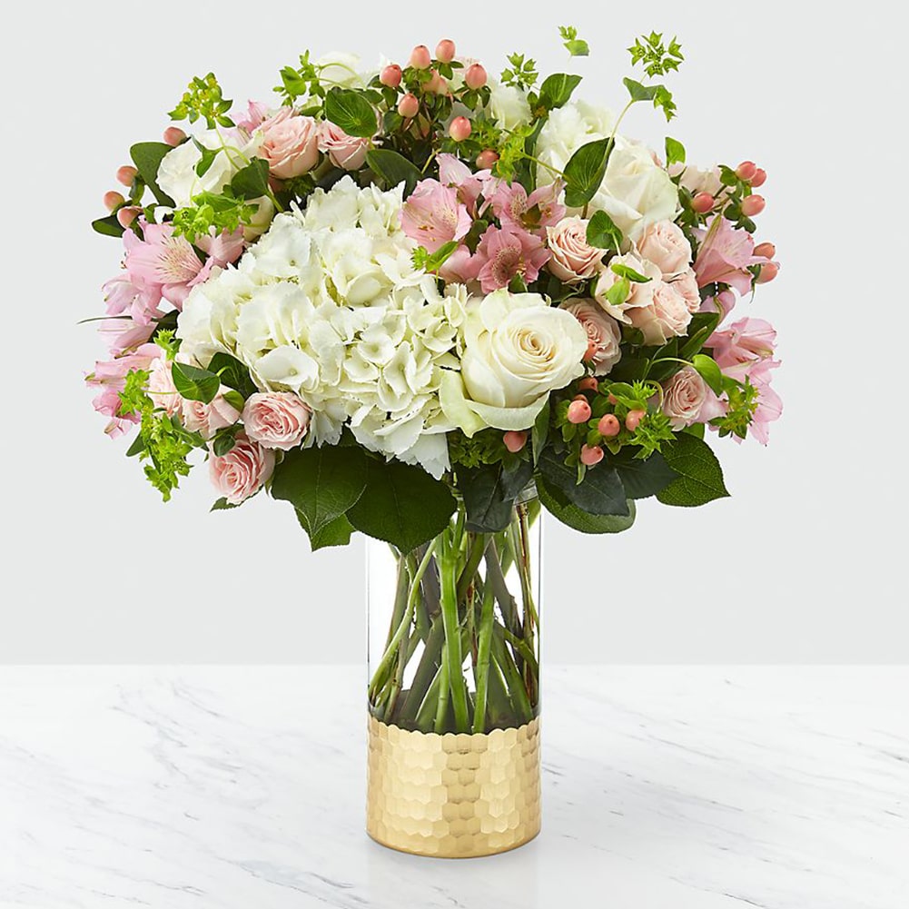 Surprise Mom with our Kisses For Mom flowers! ❤️ Honor Mom with a vase of hydrangeas, astromelias, roses and the sweet scent of imperico.