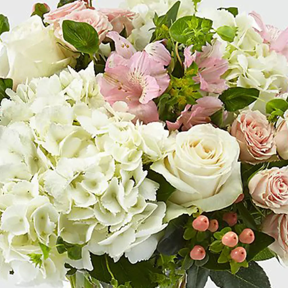 Surprise Mom with our Kisses For Mom flowers! ❤️ Honor Mom with a vase of hydrangeas, astromelias, roses and the sweet scent of imperico.