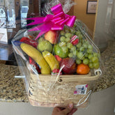Give a delicious and healthy surprise with our Orlando Fruit Basket! This beautiful basket contains a variety of fresh and juicy fruits. Fresh Flowers Orlando, we are florists.
