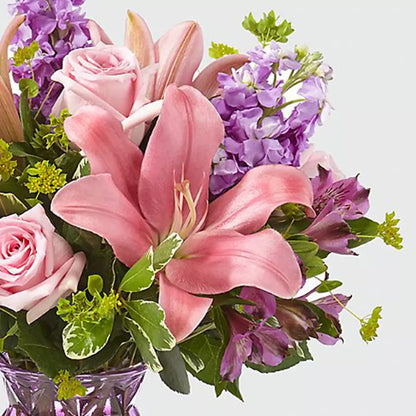 Surprise mom with this beautiful gift of flowers! Our arrangement includes elegant lilies and roses in a glass vase, flower delivery and gifts for mom, Fresh Flowers Orlando Florist, florist.
