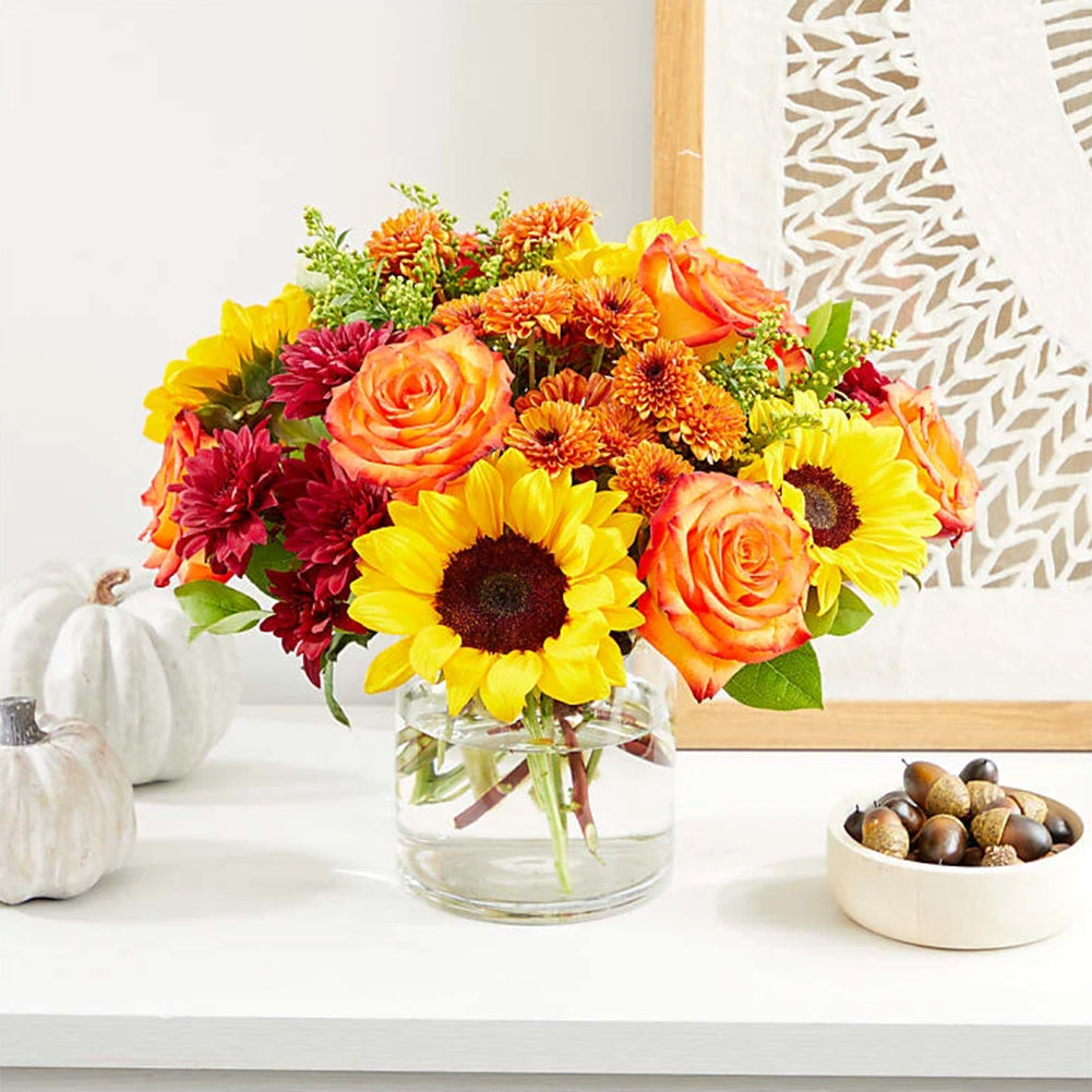Short-stem fresh flowers in a low vase