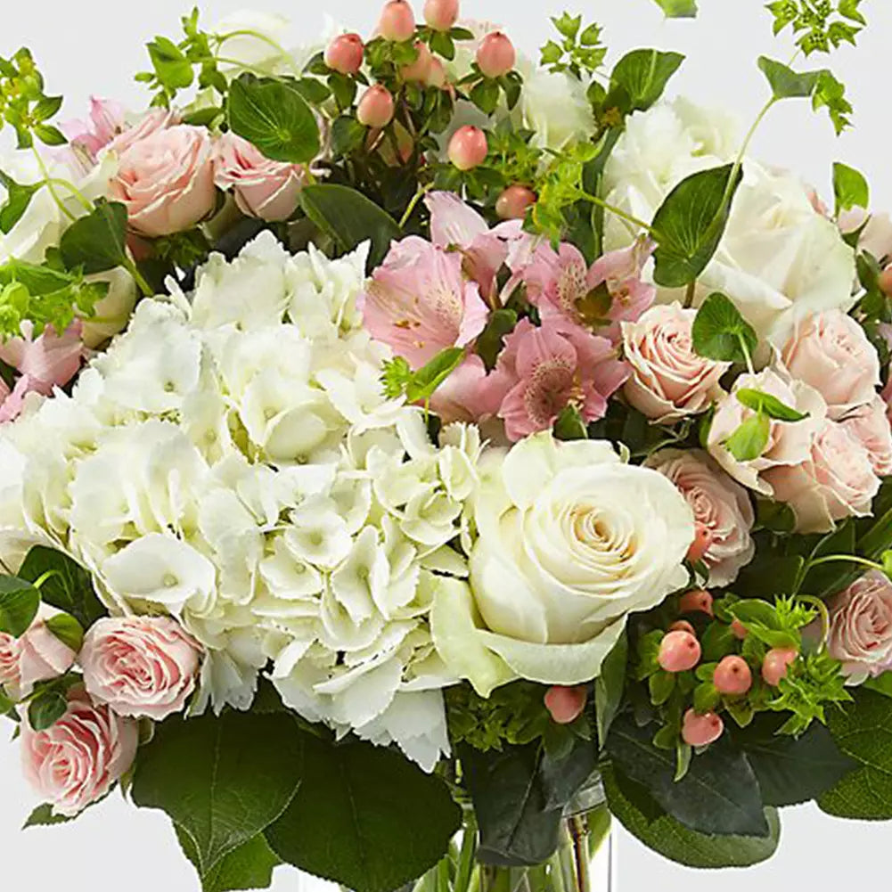 Surprise Mom with our Kisses For Mom flowers! ❤️ Honor Mom with a vase of hydrangeas, astromelias, roses and the sweet scent of imperico.