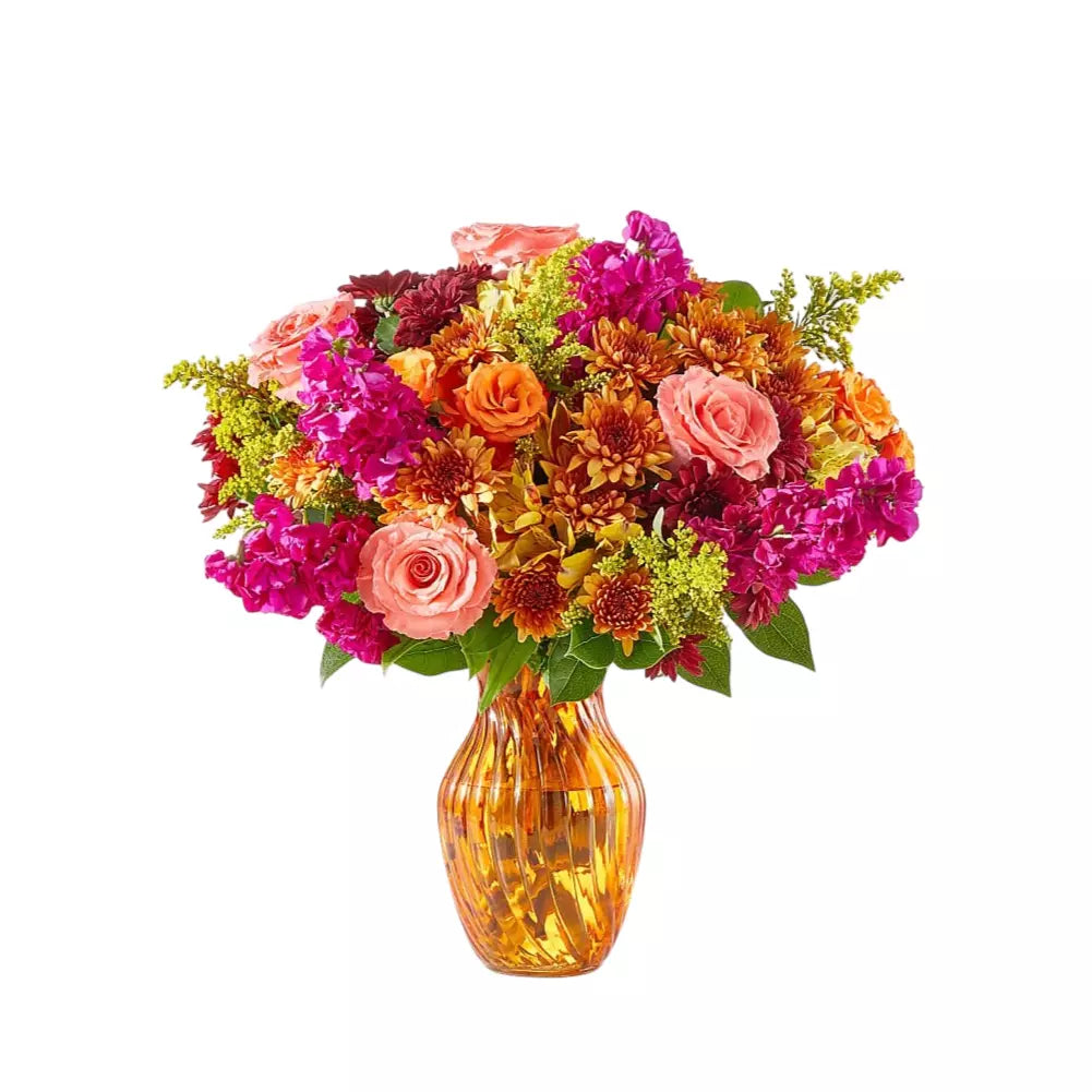 Tall fall arrangement in a yellow-orange vase