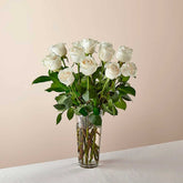 Long Stem White Rose Bouquet. With a gorgeous selection of crisp white roses among fresh greenery, this bouquet is perfect for birthdays, anniversaries, or as a way to say, "I&