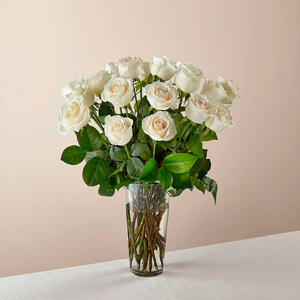 Long Stem White Rose Bouquet. With a gorgeous selection of crisp white roses among fresh greenery, this bouquet is perfect for birthdays, anniversaries, or as a way to say, &quot;I&