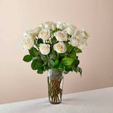 Long Stem White Rose Bouquet. With a gorgeous selection of crisp white roses among fresh greenery, this bouquet is perfect for birthdays, anniversaries, or as a way to say, "I&