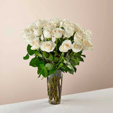 Long Stem White Rose Bouquet. With a gorgeous selection of crisp white roses among fresh greenery, this bouquet is perfect for birthdays, anniversaries, or as a way to say, "I&