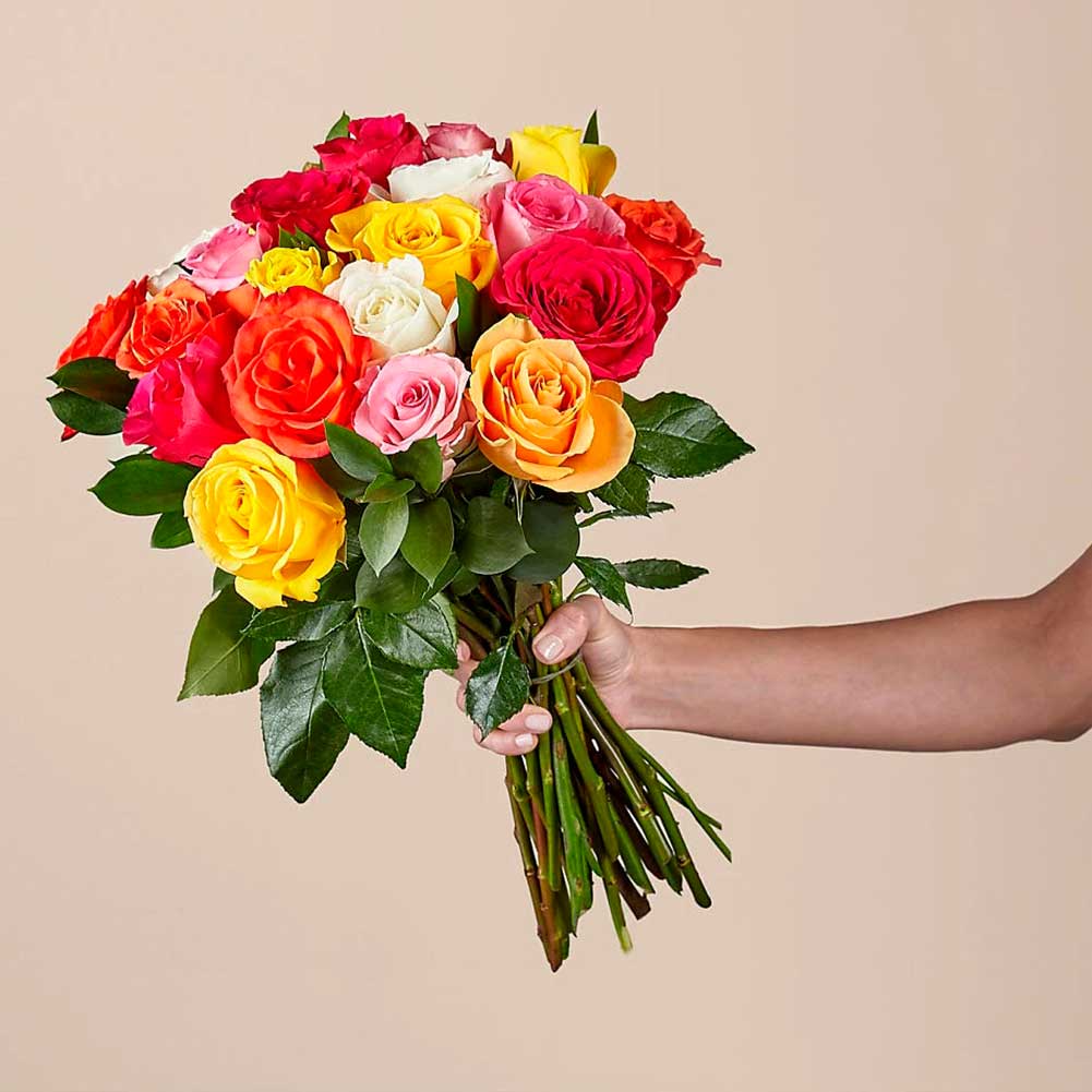 Mixed Roses with Vase. Colorful and blooming, this vibrant bouquet of a dozen roses is an instant mood booster. Fresh Flowers Orlando.